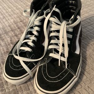 Men’s 5.5 or Women’s 7 Vans hightop shoes.
